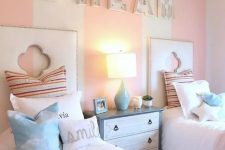 a cute kids room with a striped wall