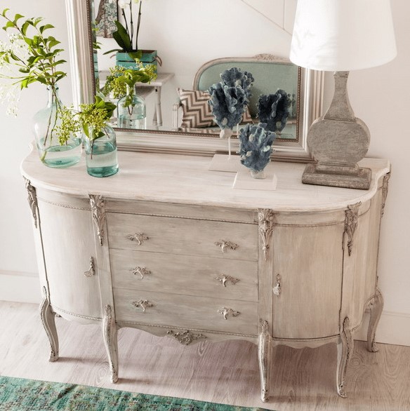 a shabby chic whitewashed dresser looks very refined, it will be a beautiful substitution to a usual console table in your entryway