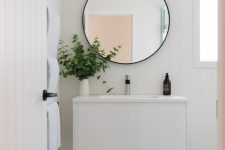 a small minimalist floating vanity composed of just one white piece with a drawer is a good idea for a modern bathroom