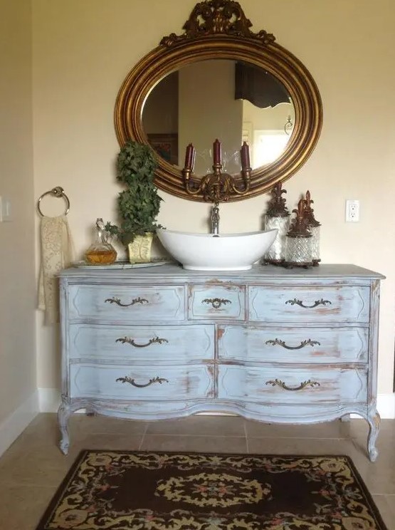 a vintage whitewashed dresser repurposed into a bathroom vanity is a beautiful idea for a bathroom with a vintage feel