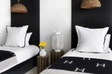 11 a cozy guest bedroom with a monochromatic color scheme and touches of wood and wicker