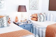 19 a fashion-inspired guest bedroom with touches of rust and chocolate brown looks very fresh and inspiring