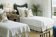 38 an art-deco styled guest bedroom with much pattern, geometric lamps and refined furniture
