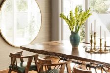 a chic greige dining room with greige walls done with grasscloth wallpaper, a living edge table and green chairs is amazing