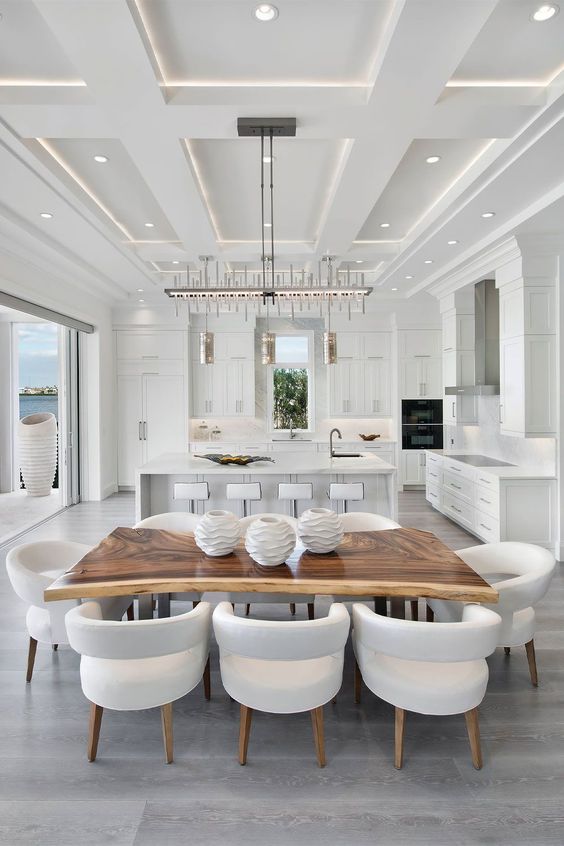 a lovely dining space with a gorgeous chandelier