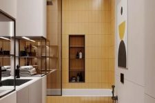 a contemporary small bathroom with all neutrals, a yellow tile bathtub zone and dark metal touches for drama