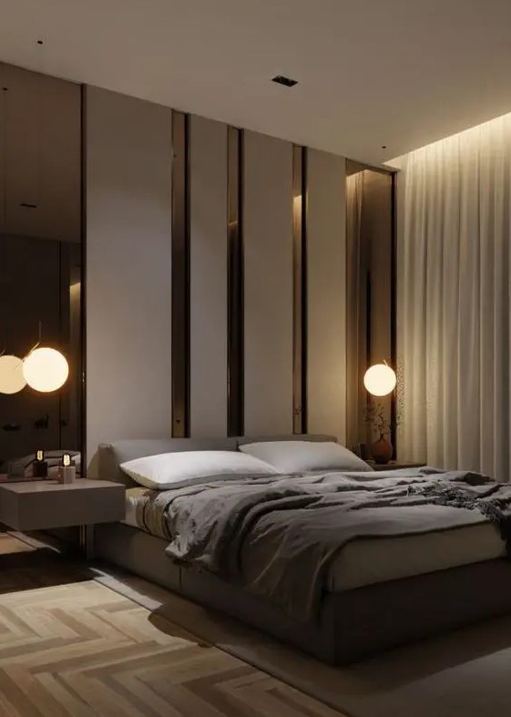 a luxurious contemporary bedroom in neutrals, with an accent headboard wall with mirrors, an upholstered bed, floating nightstands and a parquet floor