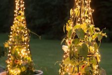 08 a creative light idea – trellises with climbing plants and lights are a catchy and interesting idea for outdoor spaces