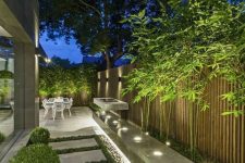 37 an outdoor space lit up with hidden lights, with built-in lights looks modern, fresh and bold and is very lit up