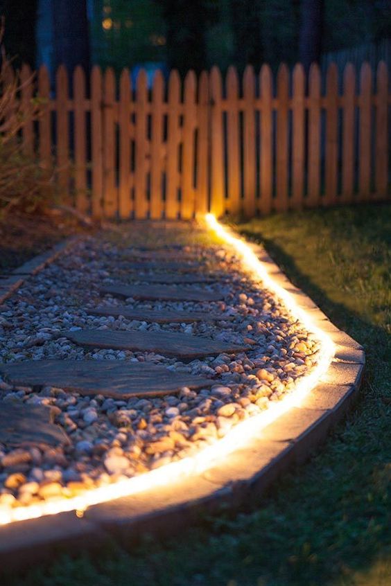 LED outdoor lights that frame the walkway are a great idea to illuminate your outdoor space in a delicate and modern way