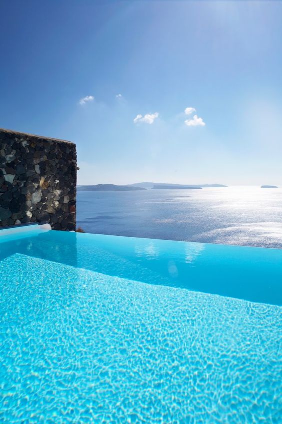a fantastic infinity pool with a sea view is a gorgeous place to refresh in and to enjoy the view on a hot day