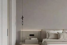 a minimalist greige bedroom with a whitewashed floating bed and nightstands, built-in lights and neutral bedding