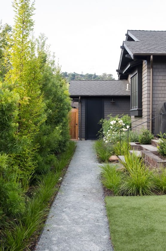 a pathway done with grey decomposed granite looks modern and chic and will fit many modern outdoor spaces