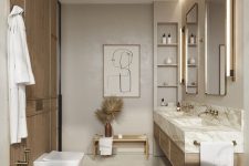 a refined contemporary bathroom with greige walls, a floating vanity with a stone countertop, white appliances and lit up mirrors
