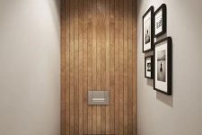 A small powder room with a gallery wall