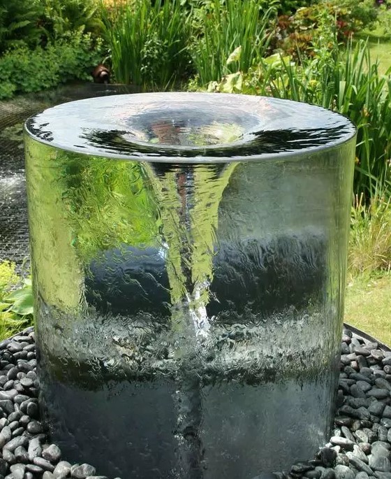 a unique vortex fountain will be a very eye catchy and bold solution in any garden, it will make you wow