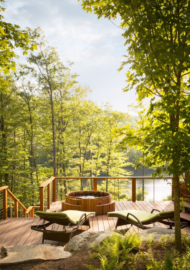 a wooden two storey hot tub on a deck is the best choice if you want to enjoy surrounding views