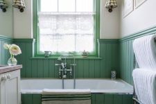 A cozy green bathroom design