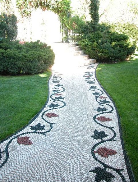 a fantastic pebble garden path with red and black leaves is a beautiful idea for a vintage-inspired outdoor space