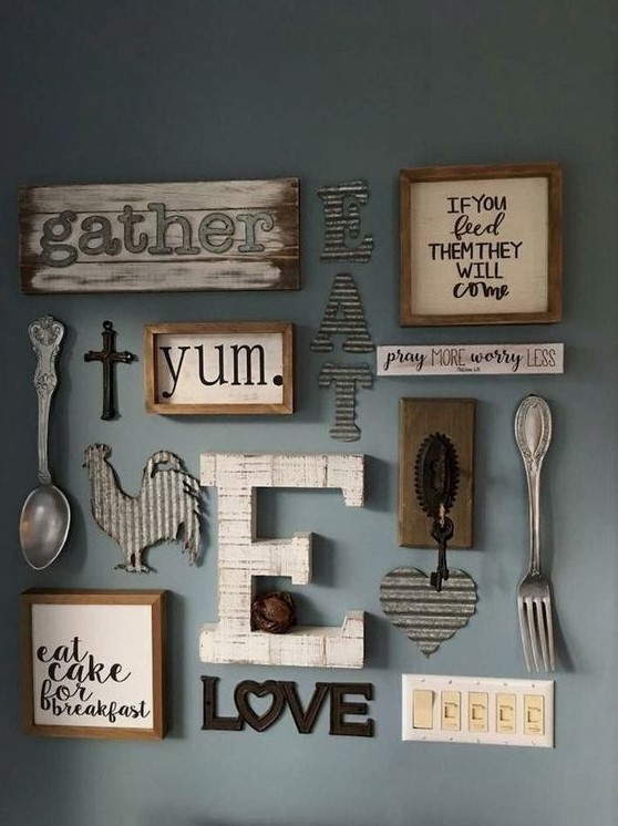 a farmhouse kitchen gallery wall with framed and non-framed signs, with letters, monograms and silhouettes of wood and metal
