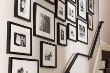 a practical b&w stairway gallery wall