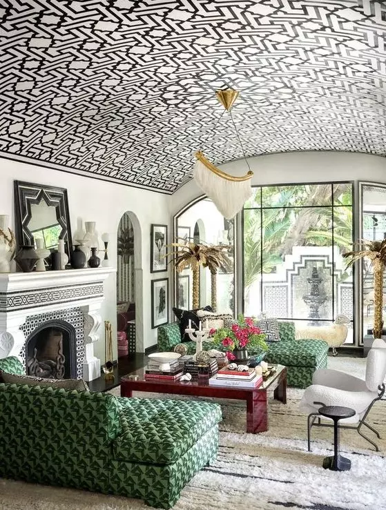 a jaw dropping living room with a graphic wallpaper arched ceiling, the pattern of which echoes with the furniture below