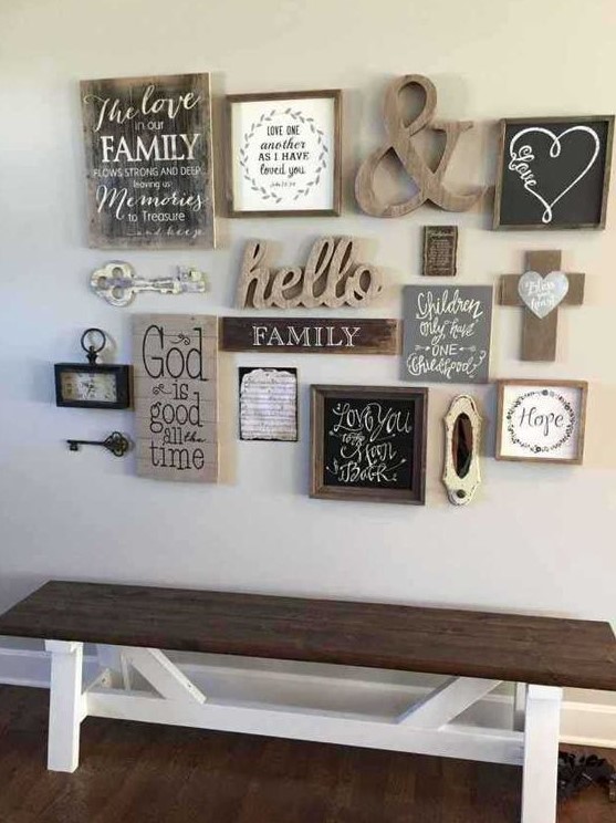 a shabby chic and rustic gallery wall with vintage keys, clocks, signs, an ampersand and chalkboard in a frame is cool