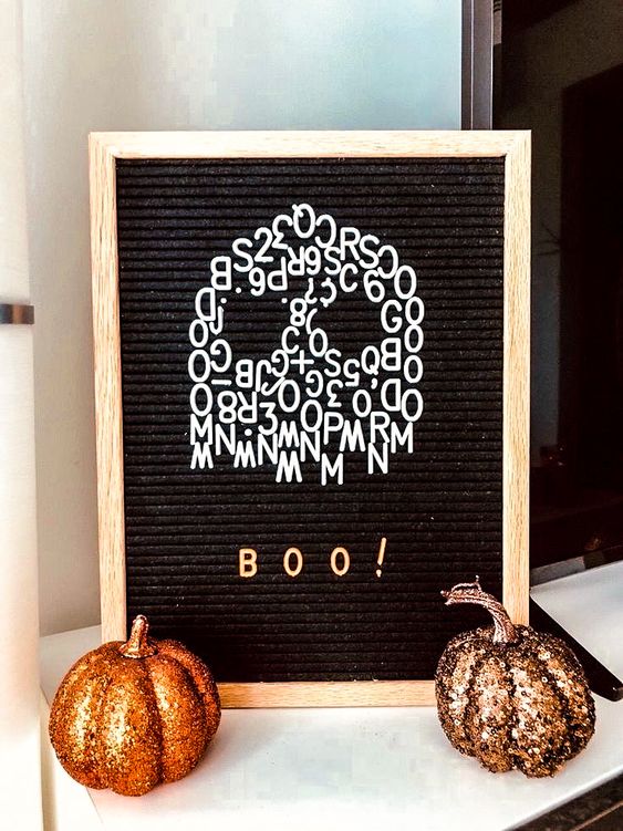 a fun and cool black and white letterboard sign is a great idea for Halloween, you may create not only letters