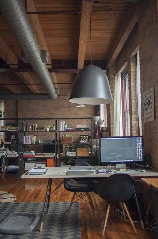 a moody industrial home office design