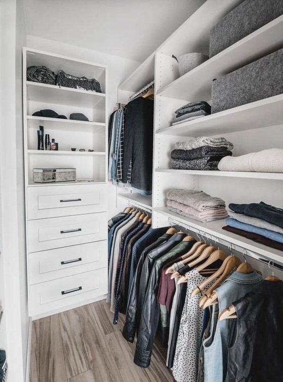 a small Nordic closet with open shelves, holders for clothes hangers and some built-in drawers is a cool idea