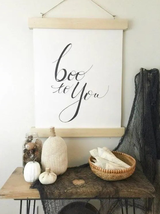a modern BOO sign of wood and paper with simple calligraphy or stenciling can be easily DIYed