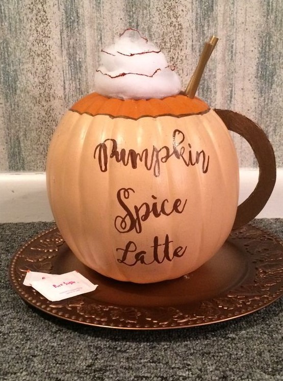 a beautiful idea to turn a pumpkin into a pumpkin spice latte with just painting and gluing some pieces is amazing