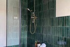 a cool shower space with skinny tiles