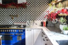 a lovely kitchen with tile backsplash