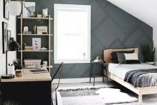 a chic farmhouse teen room with a grey paneled wall, a comfy desk and shelves by the wall, a comfy bed and printed textiles
