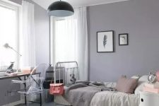 a modern grey and lilac teen girl bedroom with eclectic furniture, neutral textiles and a pendant lamp