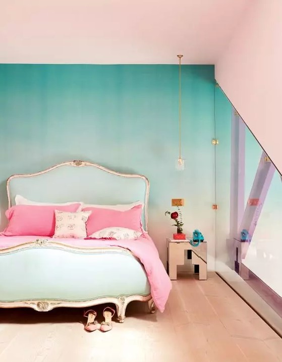 a refined bedroom with an ombre green accent wall, a refined and chic mint bed with pink bedding, a metallic nightstand