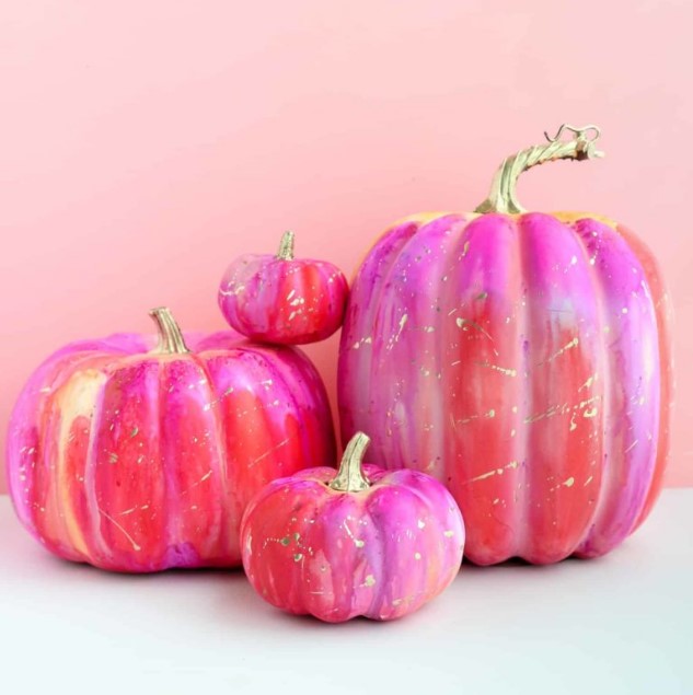 super bright and colorful alcohol ink pumpkins with gold splatters are amazing for Halloween parties in brights