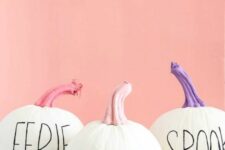02 white pumpkins with colorful stems decorated with a simple black sharpie are amazing for Halloween