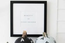 03 stylish monochromatic flying letter pumpkins are amazing for decorating your spaces for Hallowee with a modern feel