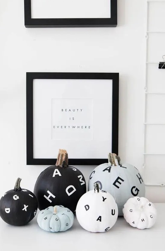 stylish monochromatic flying letter pumpkins are amazing for decorating your spaces for Hallowee with a modern feel