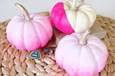 04 DIY ombre and color block pumpkins in the shades of pink are a great idea for a pink Halloween space