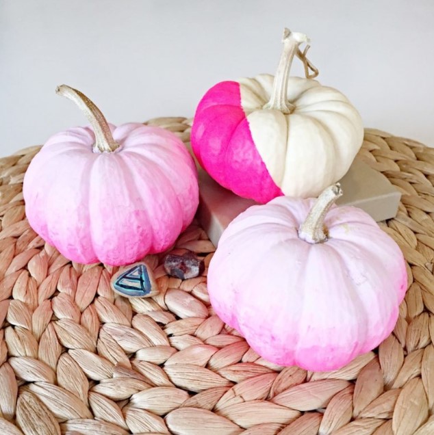 DIY ombre and color block pumpkins in the shades of pink are a great idea for a pink Halloween space