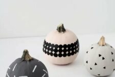 04 modern patterned pumpkins made using paints, stencils and stickers look nice and cool and will be a great idea for modern Halloween
