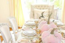 05 a chic glam Thanksgiving tablescape with woven placemats, gold rimmer glasses, pink velvet pumpkins and gold candleholders