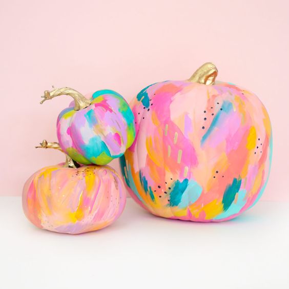 colorful neon pumpkins with a brushstroke effect, polka dots and gilded stems are amazing for Halloween decor