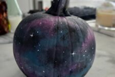 07 a fabulous black, blue, grey, purple galaxy pumpkin with tiny white stars painted is amazing for Halloween decor