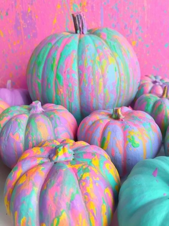 super bright and fun Halloween neon pumpkins with a watercolor effect are amazing to decorate your space