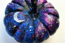 09 a small black, blue and hot pink pumpkin with white spot stars, large stars and moons for Halloween decor