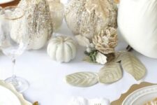 a lovely white thanksgiving table setting